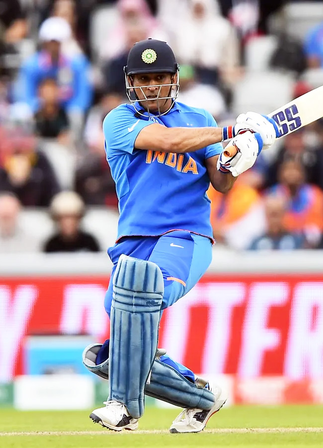"Legendary Captain 'Mr. Cool' MS Dhoni: Rare Photos"9