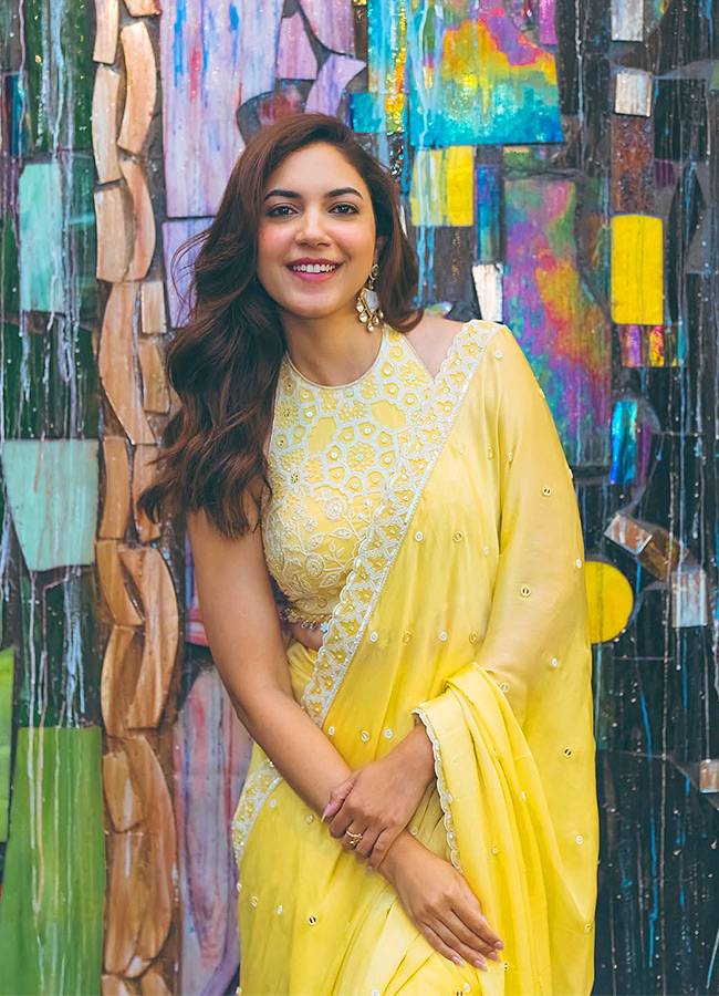 Actress Ritu Varma looks glamorous in a yellow saree Photos2