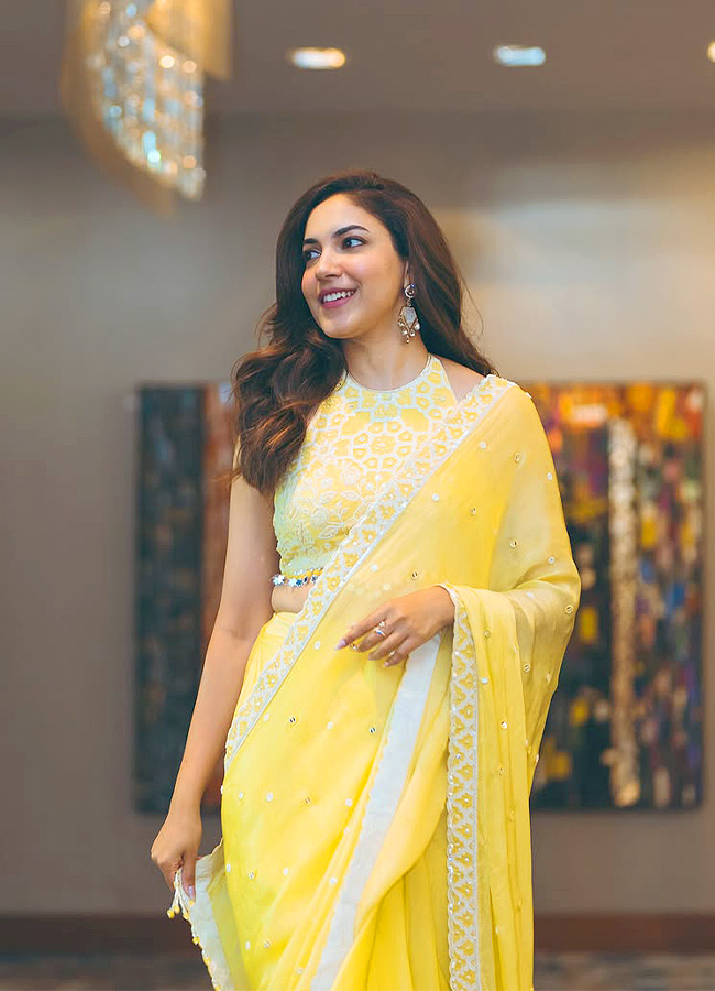 Actress Ritu Varma looks glamorous in a yellow saree Photos6