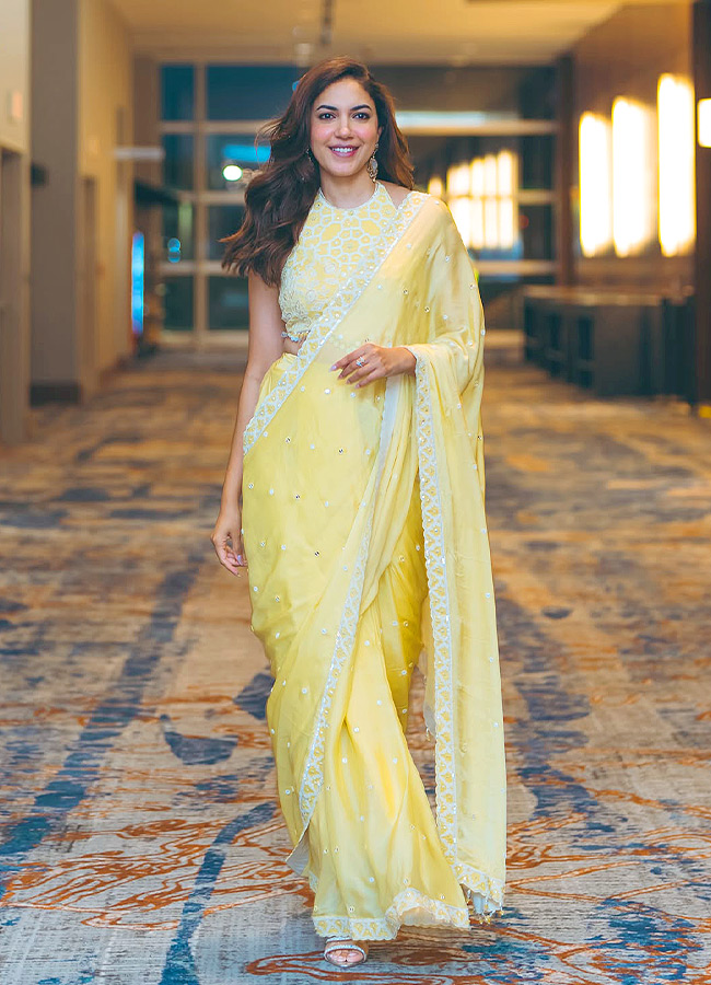 Actress Ritu Varma looks glamorous in a yellow saree Photos7