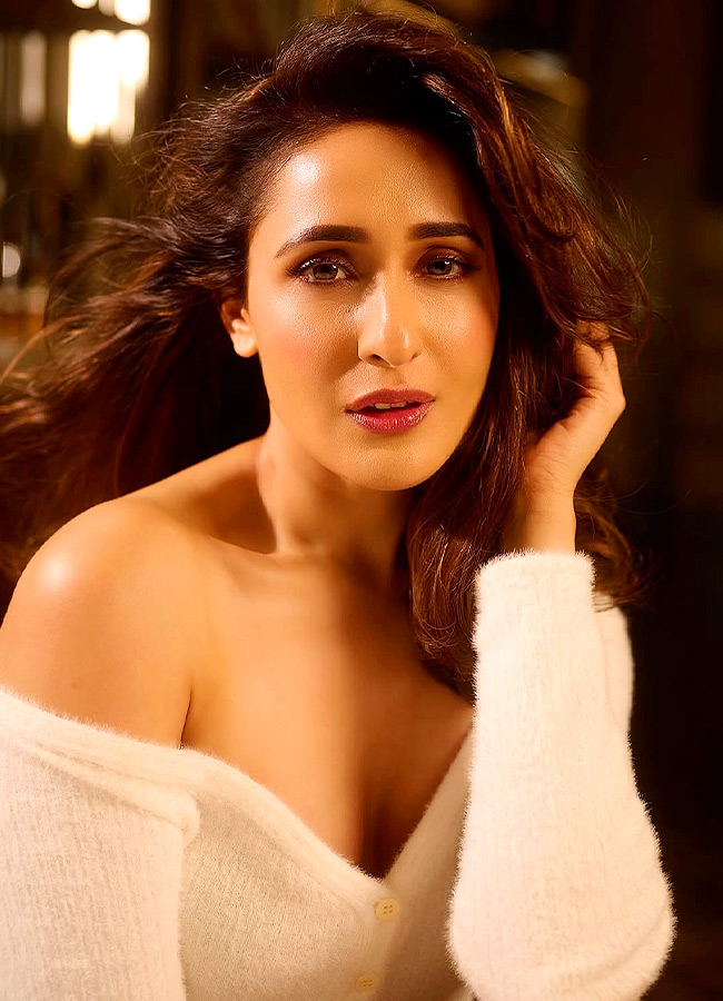 Pragya Jaiswal Works Her Glamour Magic in a White Dress Photos5