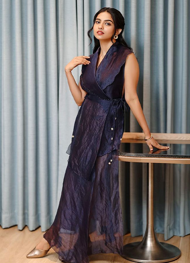 Mamitha Baiju Glamorous Look in a Black Dress Photos3