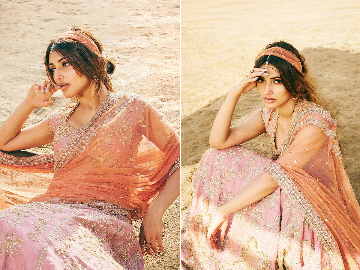 Actress Sreeleela Poses Like a Mermaid on the Beach Stunning Photos1
