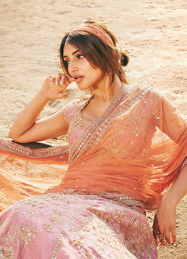 Actress Sreeleela Poses Like a Mermaid on the Beach Stunning Photos2