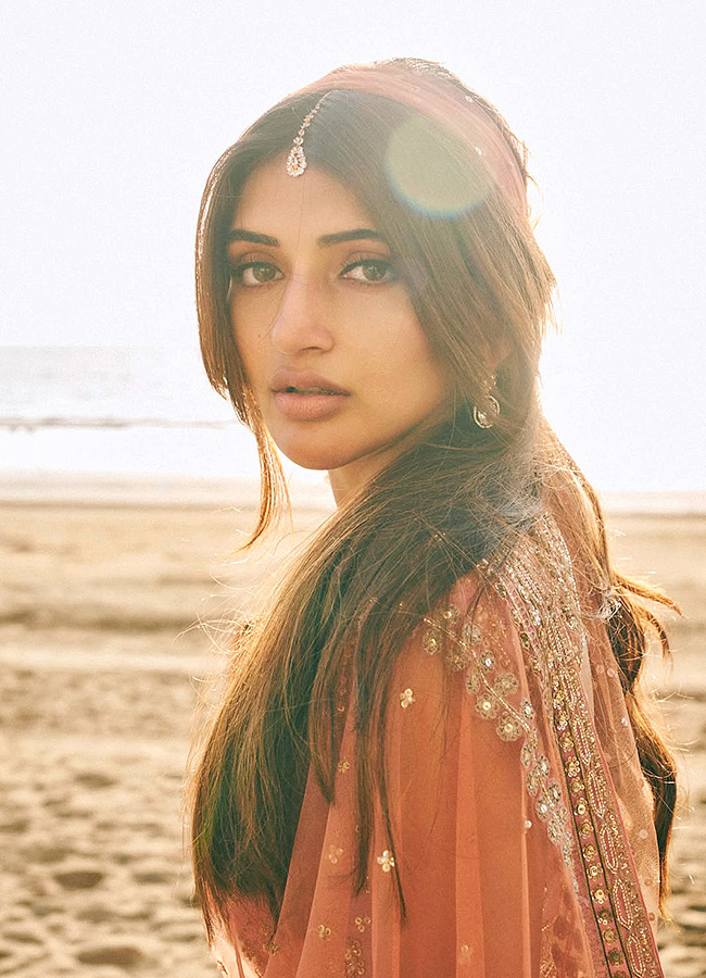 Actress Sreeleela Poses Like a Mermaid on the Beach Stunning Photos4