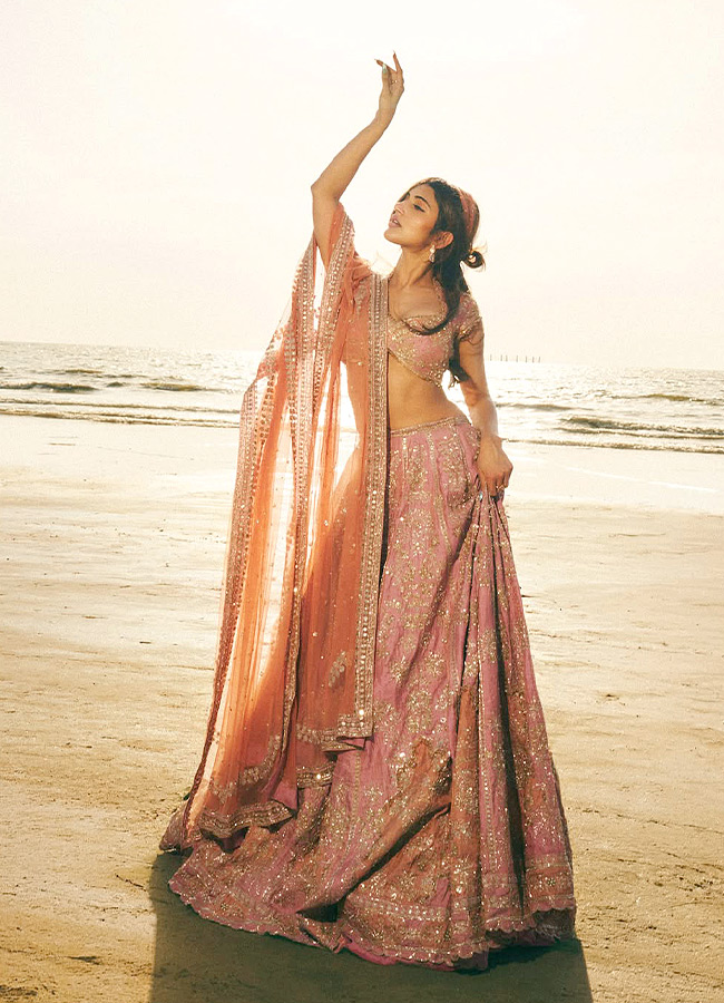 Actress Sreeleela Poses Like a Mermaid on the Beach Stunning Photos7