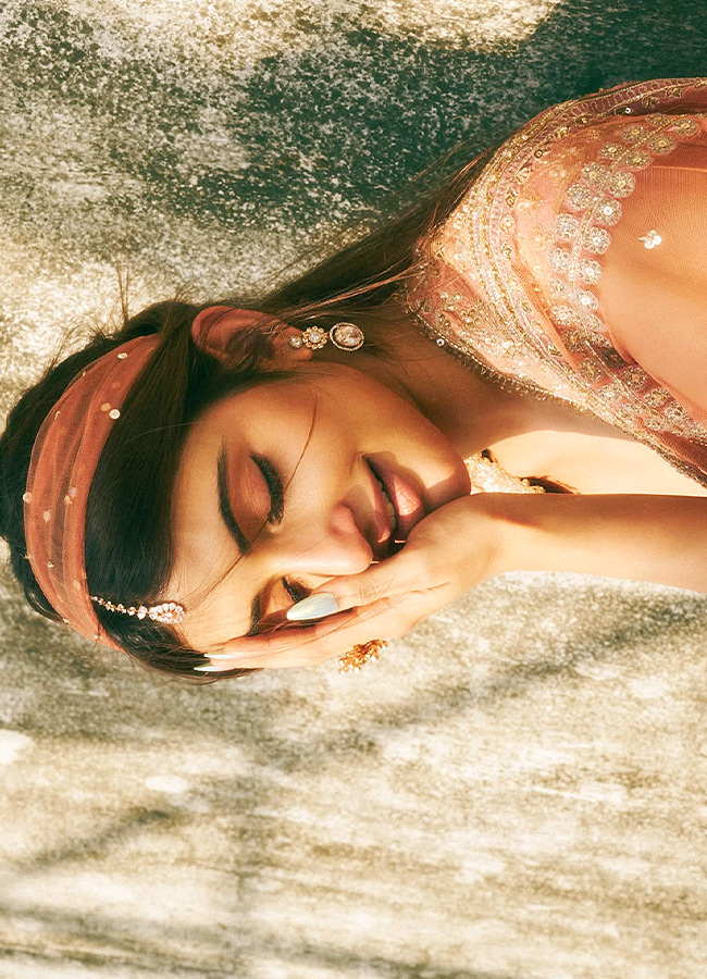 Actress Sreeleela Poses Like a Mermaid on the Beach Stunning Photos8