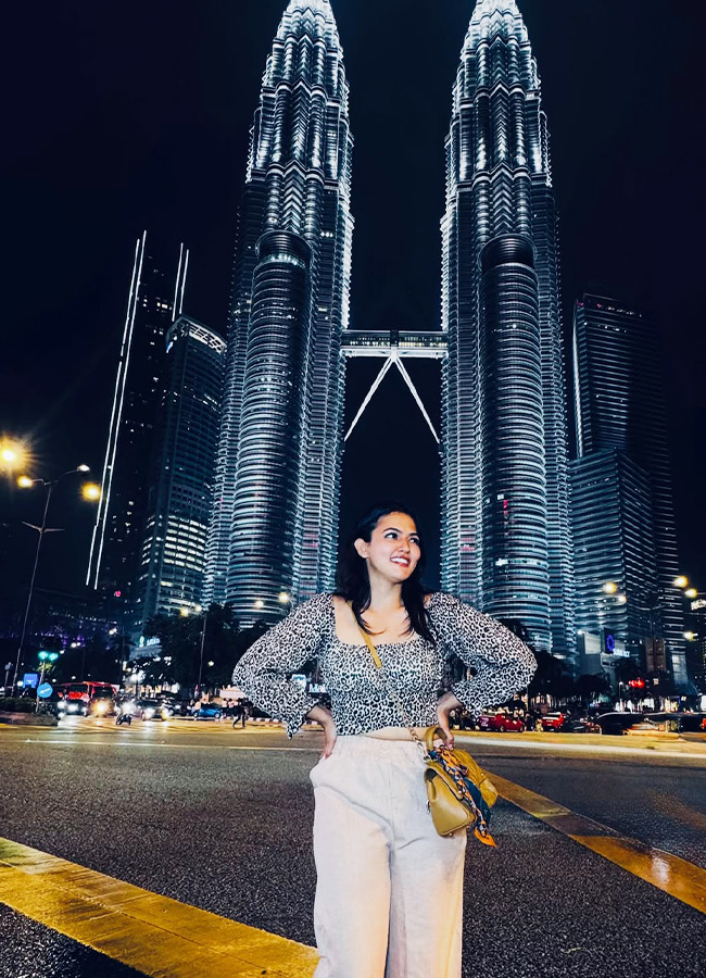 Actress Aparna Malaysia Trip with Her Husband Photos9