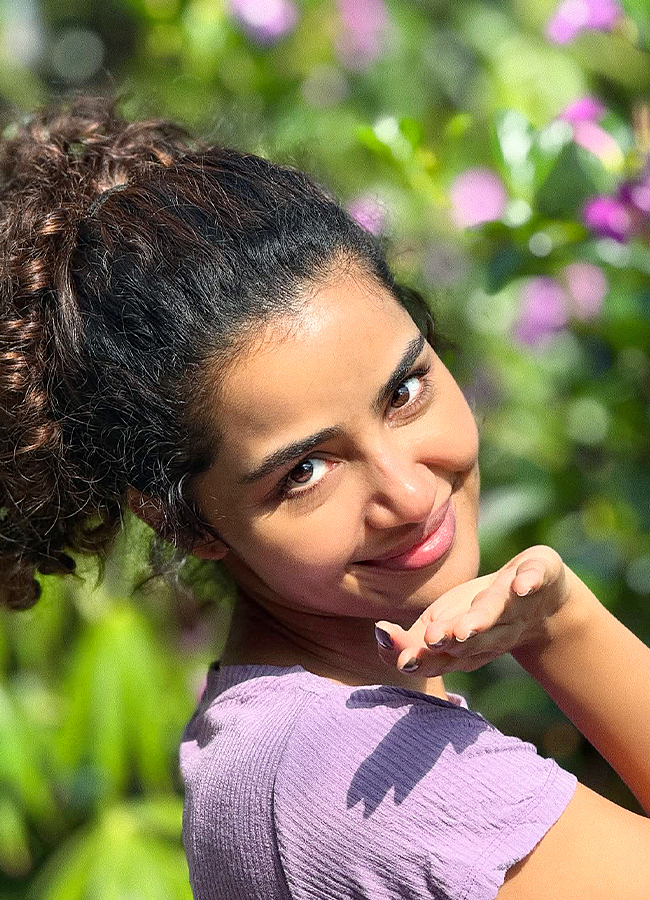 Anupama Parameswaran Chills in a Flower Garden Photos2