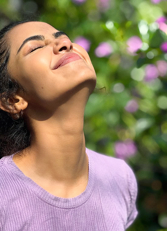 Anupama Parameswaran Chills in a Flower Garden Photos3