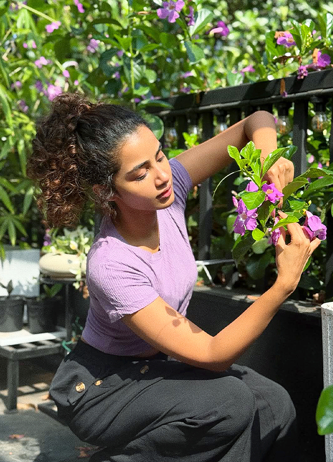 Anupama Parameswaran Chills in a Flower Garden Photos4