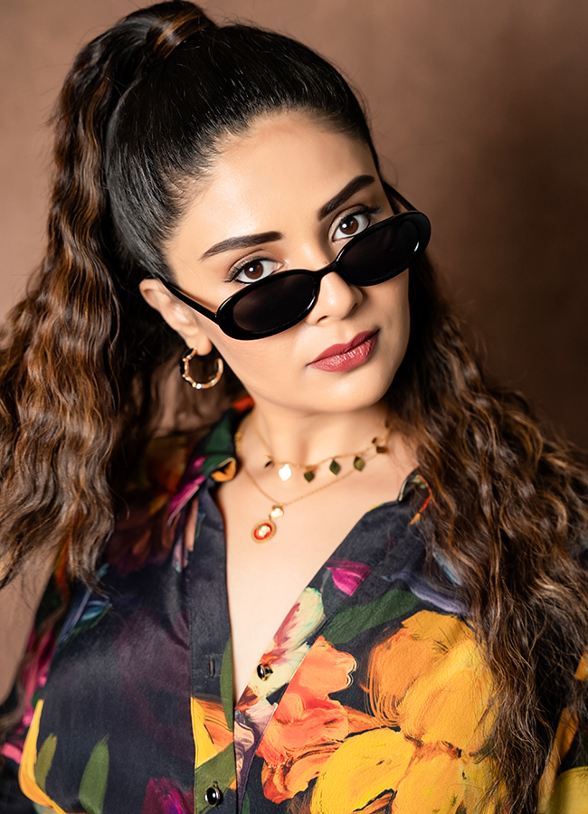 Anchor Sreemukhi Stuns in a Floral Dress 11