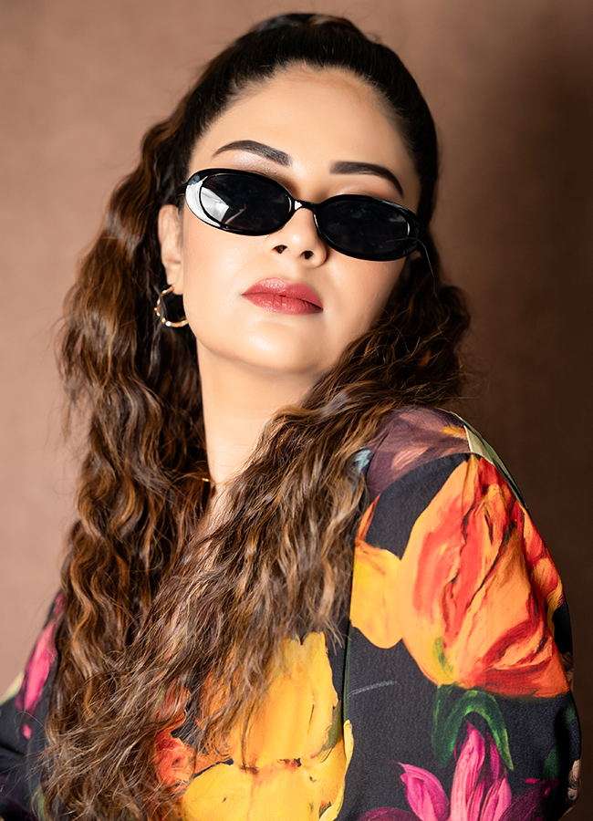 Anchor Sreemukhi Stuns in a Floral Dress 14