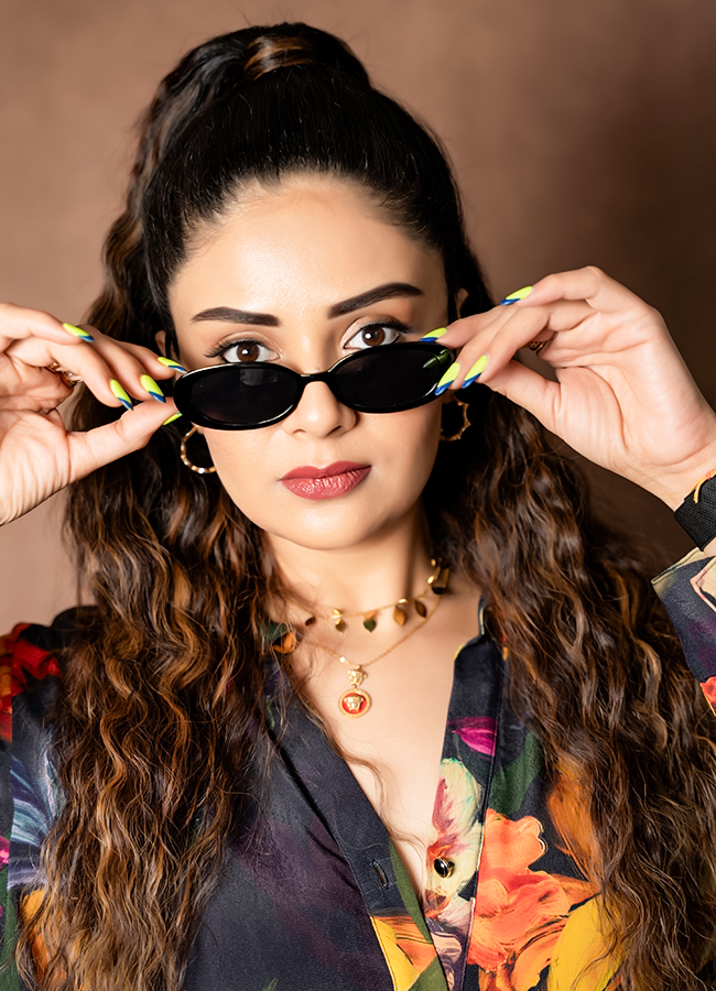 Anchor Sreemukhi Stuns in a Floral Dress 9