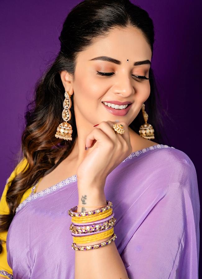 Sreemukhi Stuns in a Colorful Saree15