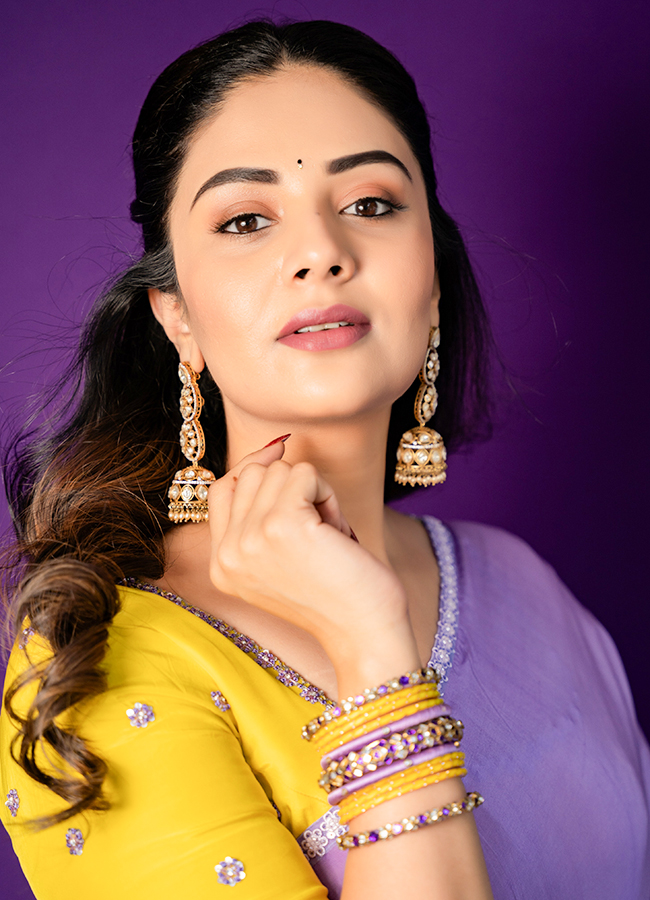 Sreemukhi Stuns in a Colorful Saree5