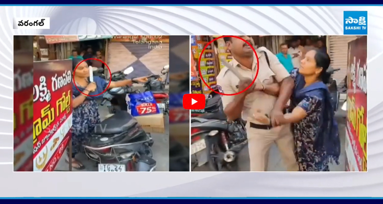 వరంగల్ చౌరస్తాలో కత్తితో వివాహిత హల్చల్