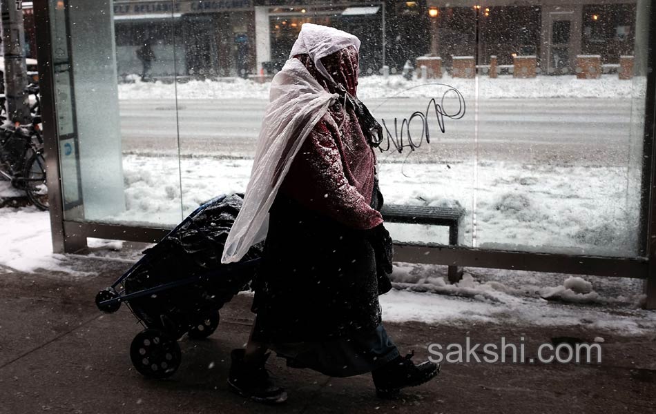 snow storm at usa - Sakshi