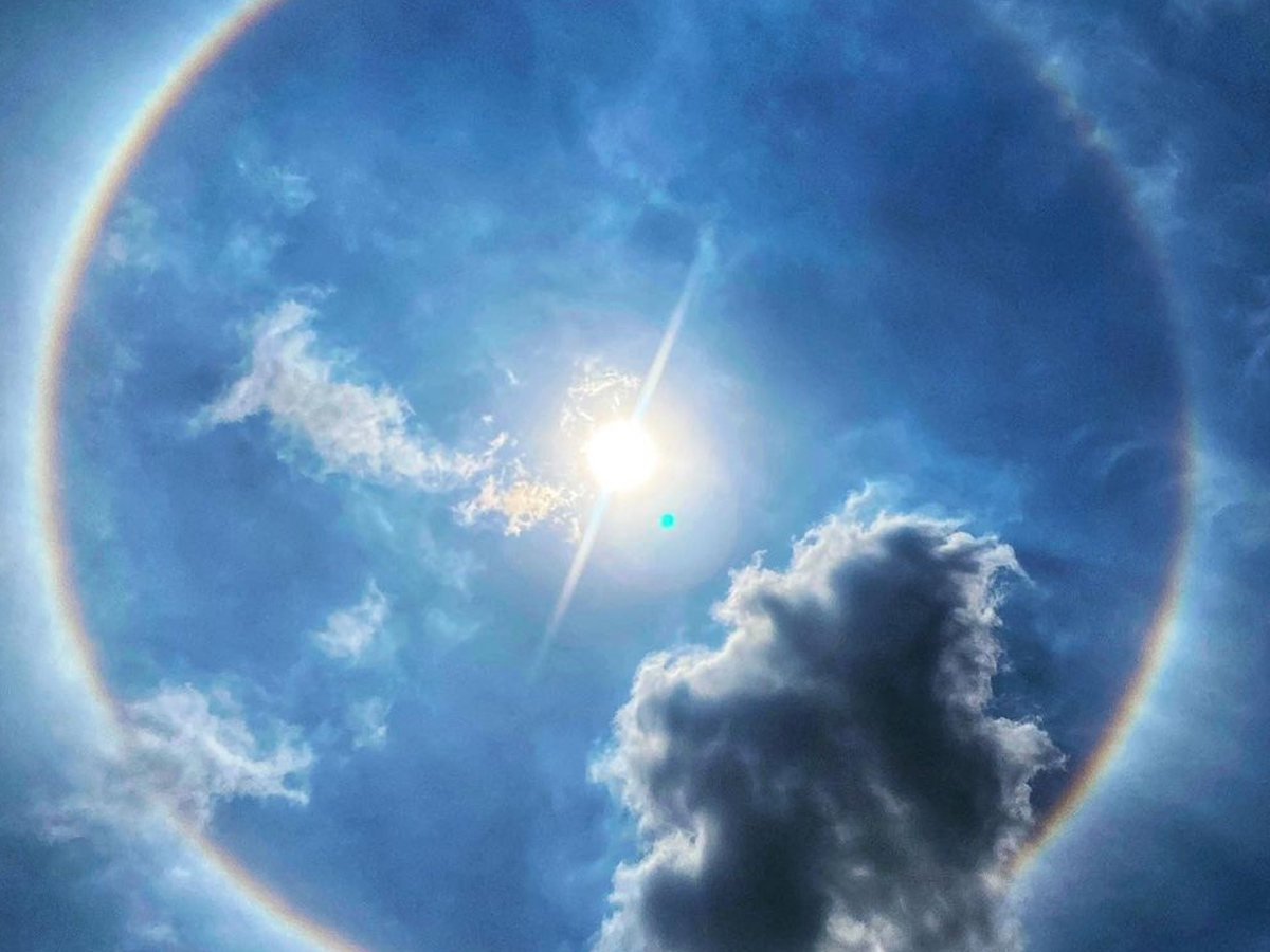  Rainbow halo around sun in Hyderabad Photo Gallery - Sakshi