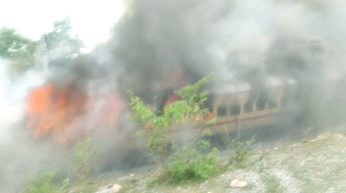 Falaknuma Express train catches fire near Hyderabad - Sakshi