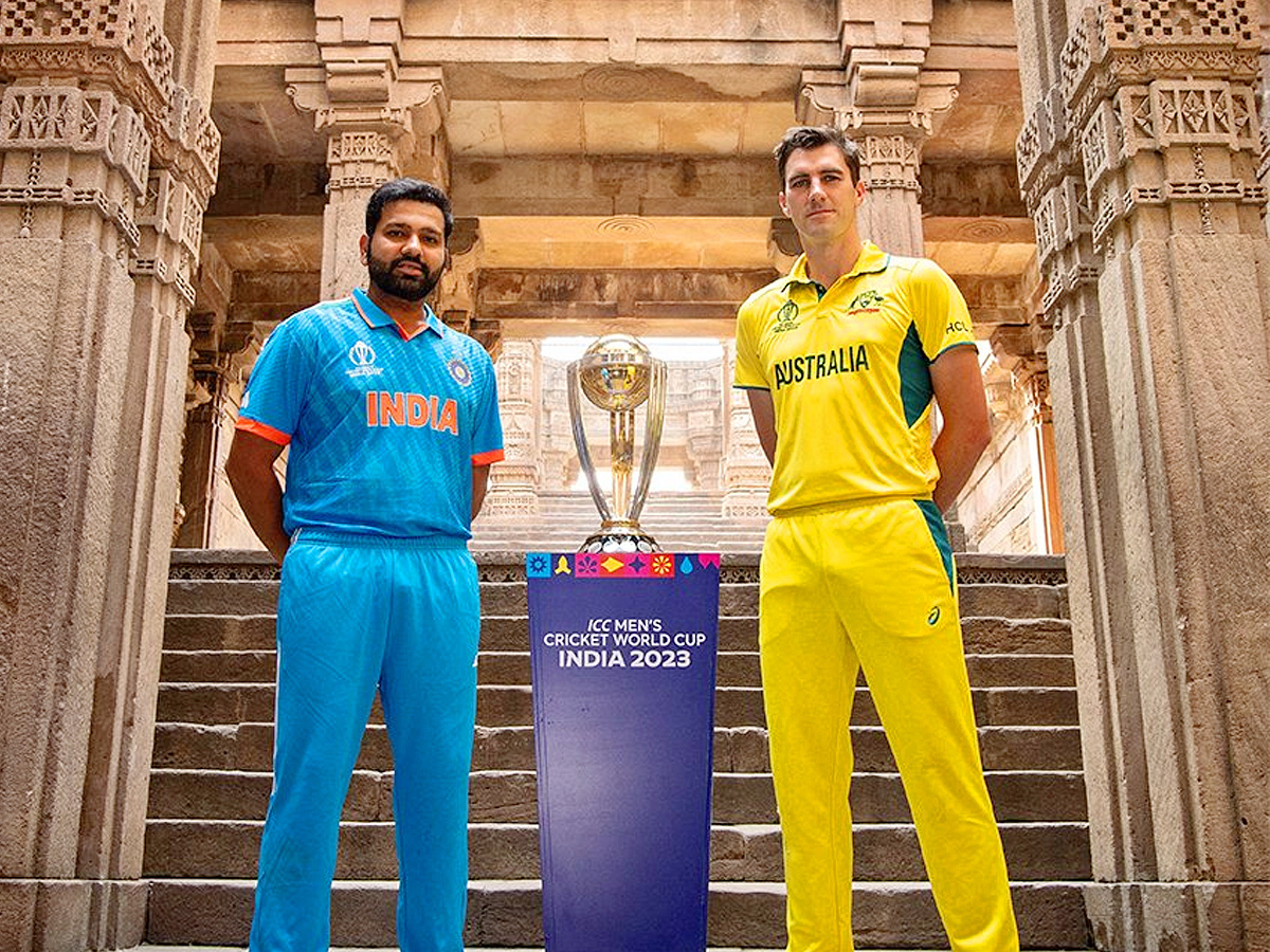 Captains Rohit Sharma and Pat Cummins with the trophy ahead of 2023 World Cup final Photos - Sakshi
