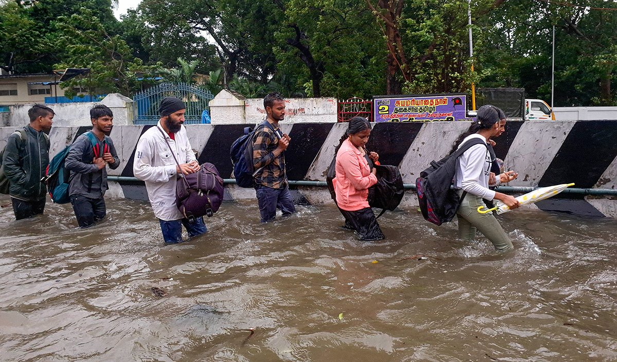 Cyclone Michaung As Rain Floods Chennai - Sakshi