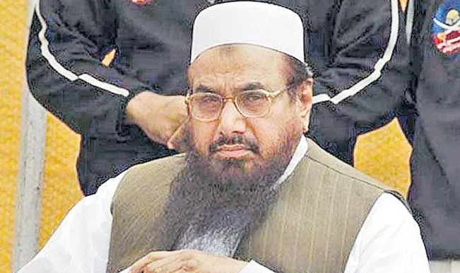 Pakistan Plans to Seize Control of Terrorist Hafiz Saeed's Jamaat-ud-Dawa, Financial Assets - Sakshi