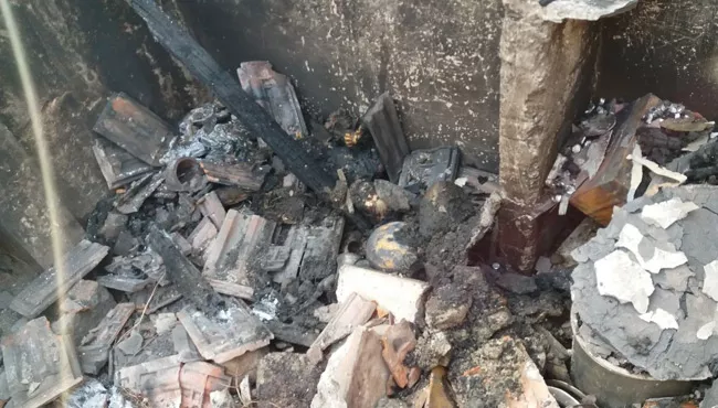 house burned.. woman burned alive - Sakshi