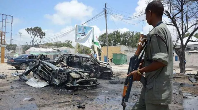 18 dead after 2 blasts, gunfire rock Somalia's capital - Sakshi