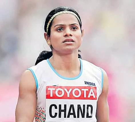 Dueti chandu  gold in the women's 100 meter race - Sakshi
