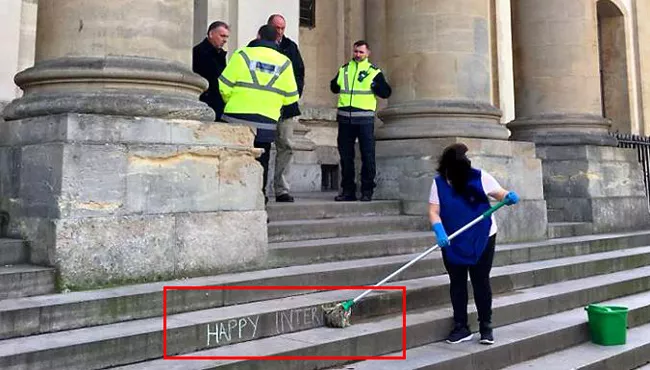 Oxford Apologises For Photo Of Female Worker - Sakshi