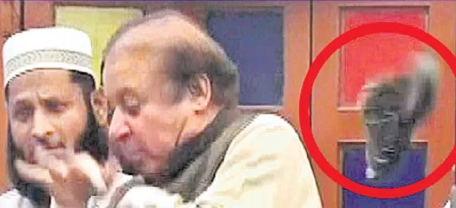 Shoe hurled at former Pakistan PM Nawaz Sharif - Sakshi