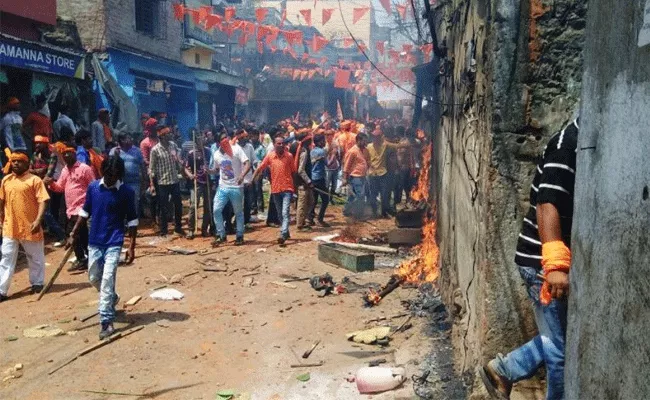 BJP and Bajrang Dal Accused For Communal Clash In Bihar - Sakshi