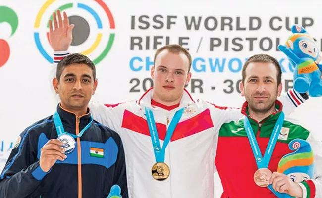 One Silver Medal For India In ISSF - Sakshi