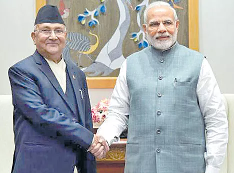 PM Modi meets KP Sharma Oli in Delhi - Sakshi