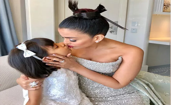Aishwarya Rai Being Trolled For Kissing Daughter On Lips - Sakshi