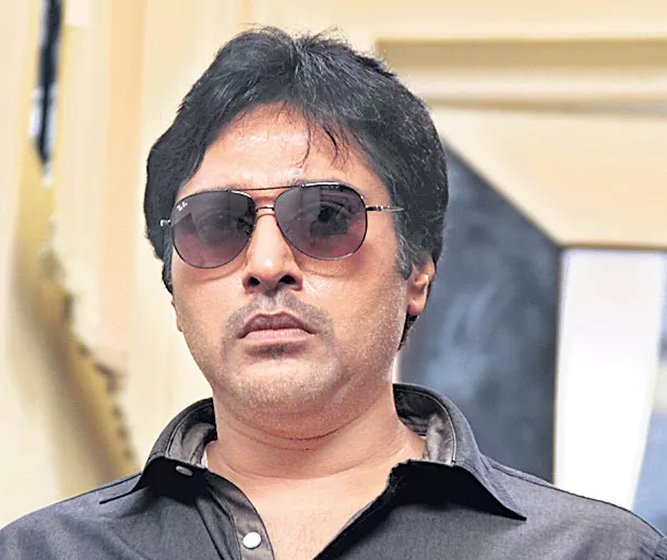 Rahman Oru Mugathirai To Be Released In Telugu - Sakshi