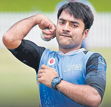 Rashid Khan, Mujeeb Ur Rahman selected as part of Afghanistan squad to face India - Sakshi