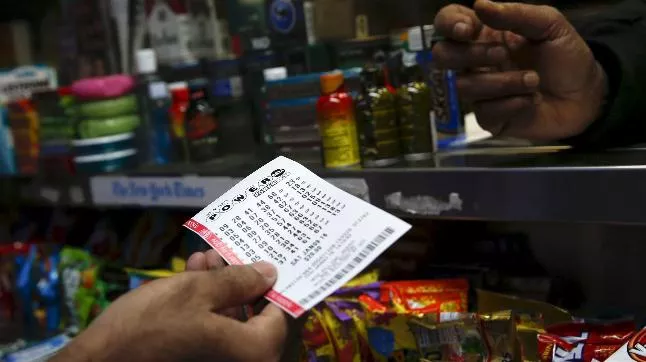 Vegetable seller wins Over Rs One crore in lottery - Sakshi