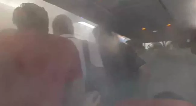 Air Asia Staff Behaves Rude With Passengers Made Them Vomit - Sakshi