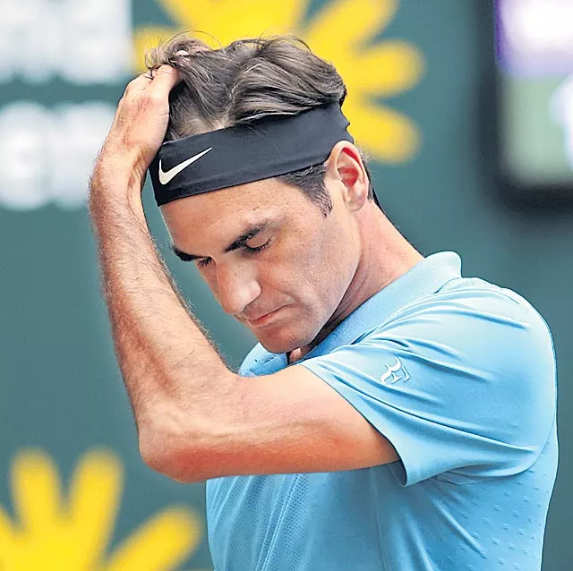  Borna Coric ends Roger Federer hot streak on grass - Sakshi
