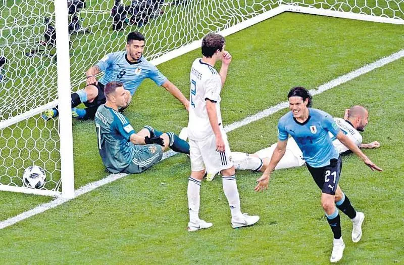 Uruguay Wins World Cup Group A With Romp Over Russia - Sakshi