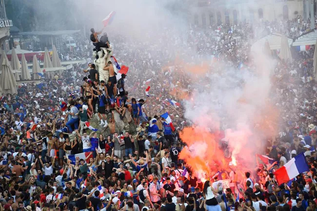 France Celebrations Marred As Two Fans Die And Cops Fire Tear Gas  - Sakshi