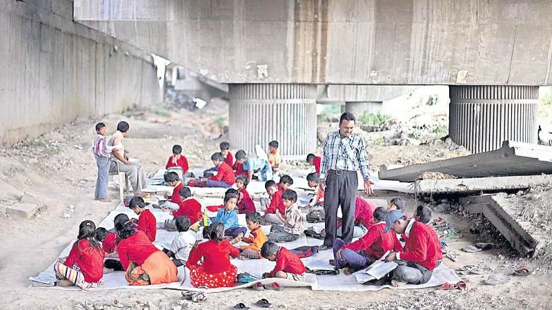  Education to under the railway track - Sakshi