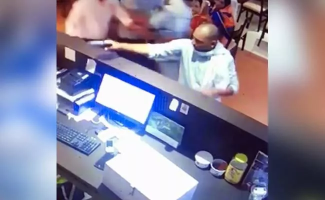 A Man Fires At Restaurant Owner In UP - Sakshi