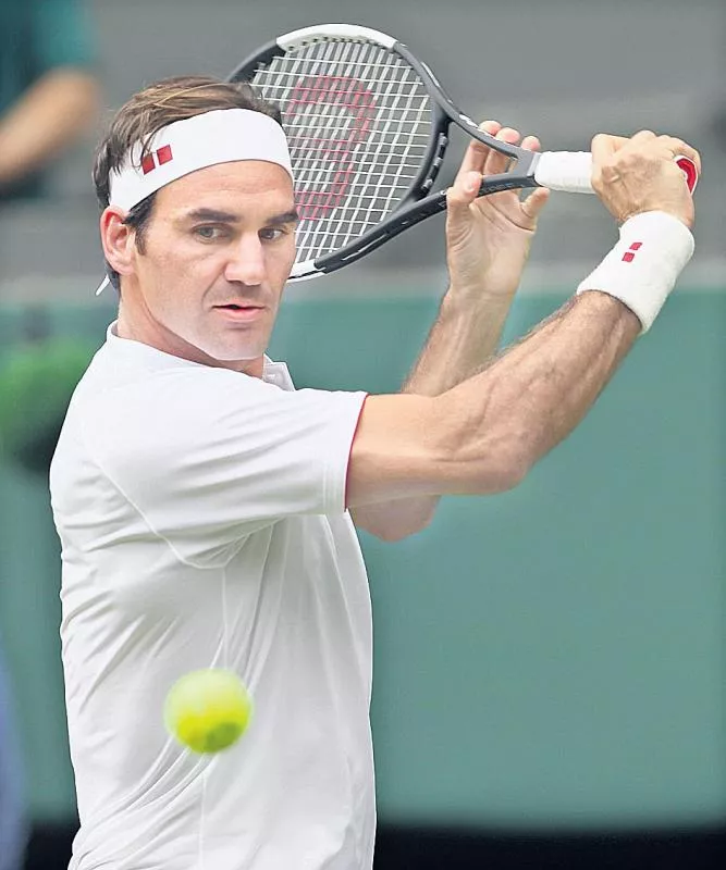 Roger Federer reacts to major announcement at Wimbledon - Sakshi