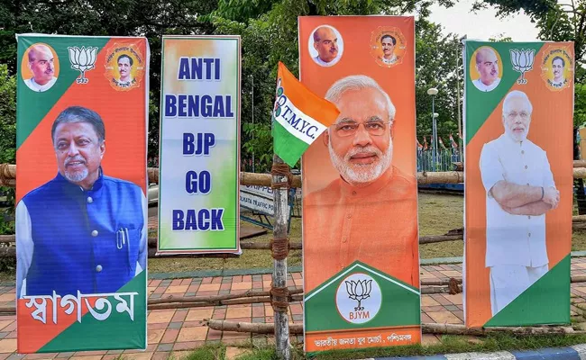 Anti Bengal Go Back Posters In Bengal Against Amit Shah Rally - Sakshi