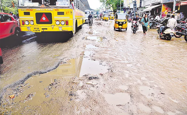 Hyderabad City People Suffering With Rain Potholes - Sakshi
