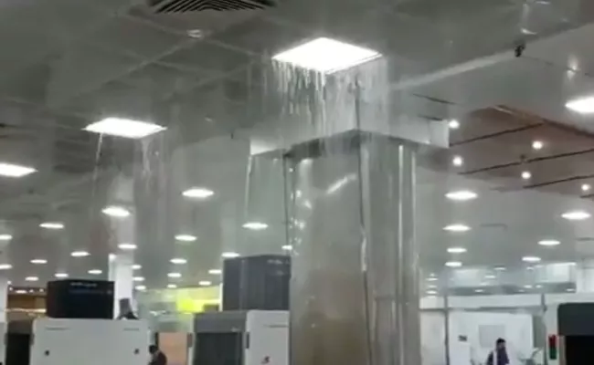 Rain Water Leakage In Guwahati Airport - Sakshi