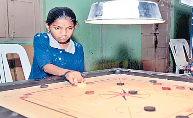 Nandini enters Quarters of Telangana Carrom Tournament - Sakshi